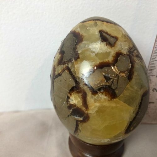 Serpentine carved egg 215g with wood stand